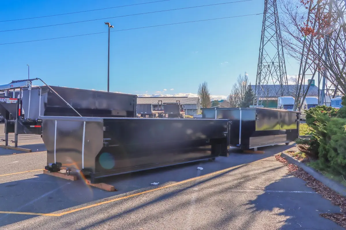Roll-off dumpster ready for waste disposal at job site for Construction Dumpster Rental in University Heights